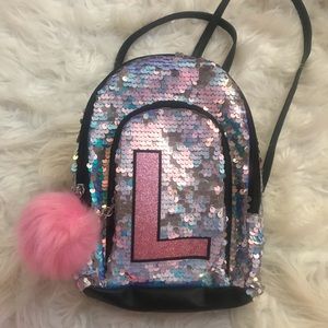 Mini sparkly justice book bag/purse NWOT